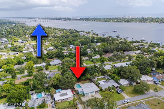 59 Arroyo Pkwy, Ormond Beach, FL 32174 - aerial view of property and surrounding area featuring a large body of water and nearby suburban area