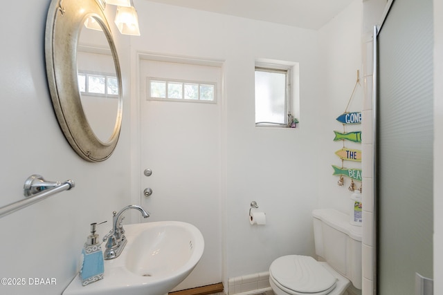 59 Arroyo Pkwy, Ormond Beach, FL 32174 - bathroom featuring a sink and toilet