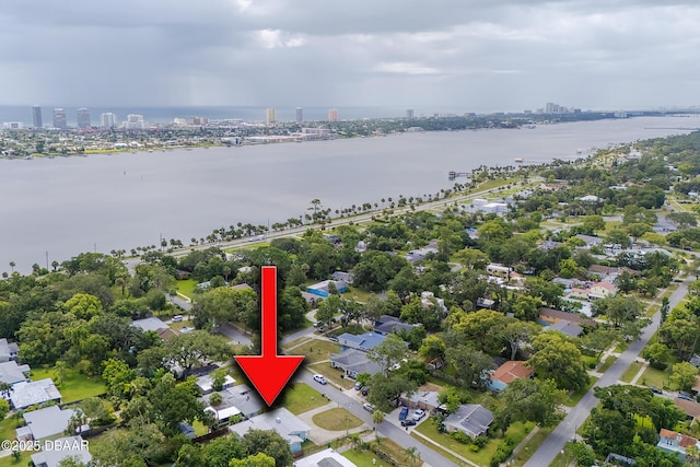 59 Arroyo Pkwy, Ormond Beach, FL 32174 - aerial view of property and surrounding area featuring a large body of water and nearby urban area