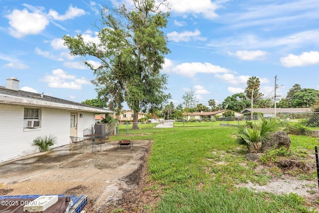 24 Tomoka Oaks Blvd, Ormond Beach, FL 32174 - view of yard featuring a fire pit, a patio area, and cooling unit