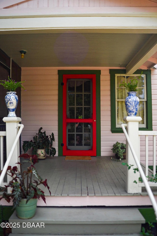deck featuring covered porch