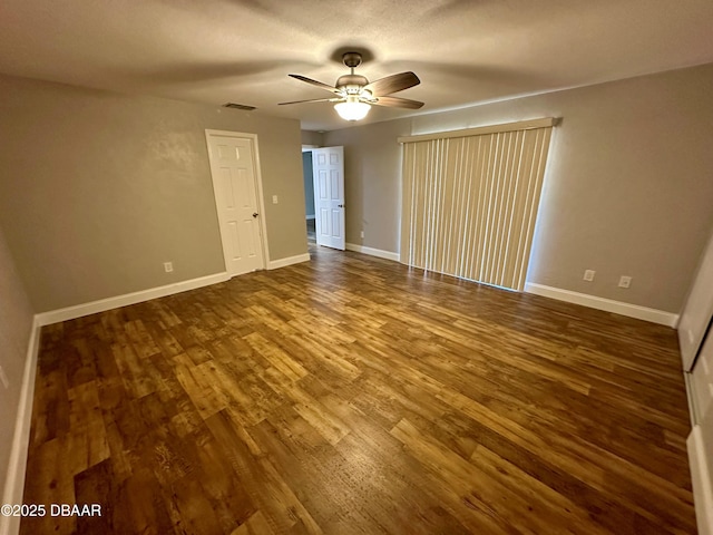 interior space featuring wood-type flooring and ceiling fan