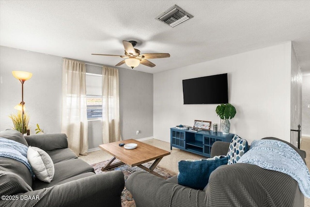 211 Fox Pl, Port Orange, FL 32127 - living area with carpet, a ceiling fan, and a textured ceiling
