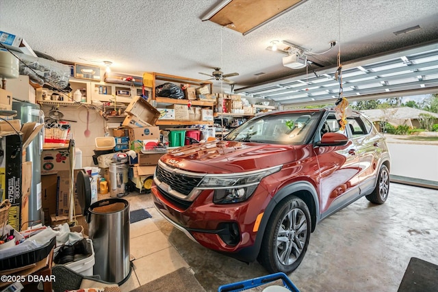 garage featuring a garage door opener and ceiling fan