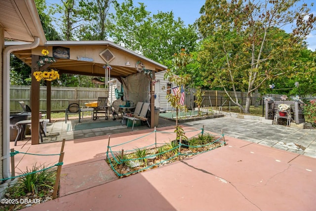 view of patio with a fenced backyard