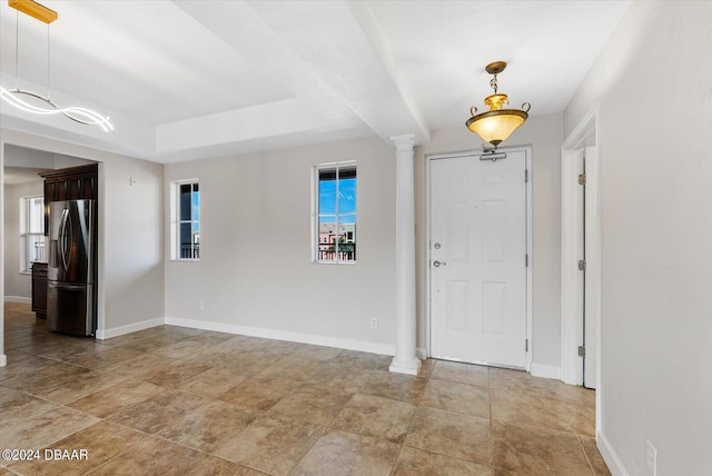 foyer with ornate columns