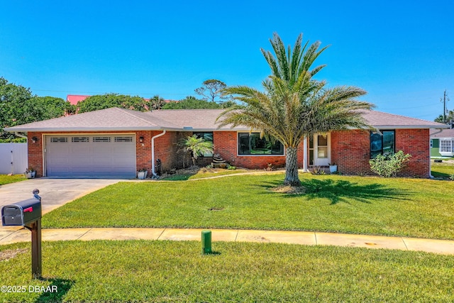 16 W Tipperary Ln, Ormond Beach, FL 32176 - back of house featuring a gate, a fenced backyard, a patio, a lawn, and brick siding