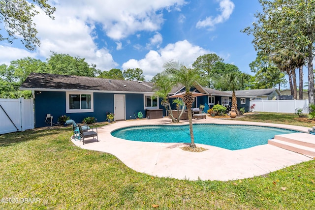 view of pool featuring a fenced in pool, a patio, a yard, and a fenced backyard