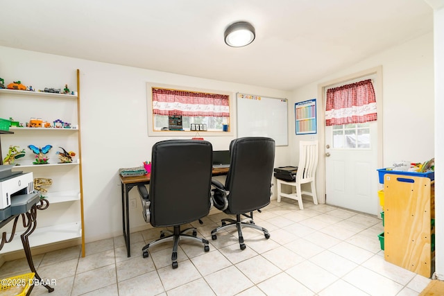 home office with tile patterned flooring