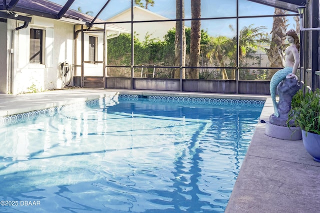 outdoor pool with glass enclosure