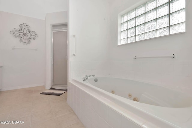 50 Spring Meadows Dr, Ormond Beach, FL 32174 - bathroom with a shower stall, a tub with jets, and tile patterned flooring