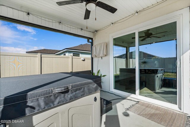 view of patio with ceiling fan