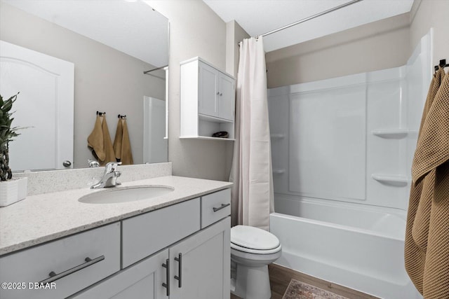 full bathroom featuring shower / tub combo, vanity, toilet, and hardwood / wood-style floors