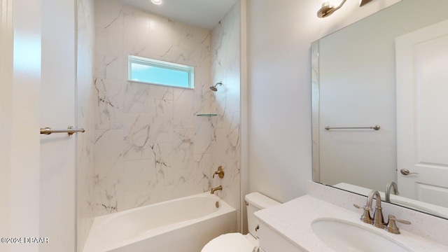 bathroom featuring tub / shower combination, toilet, and vanity