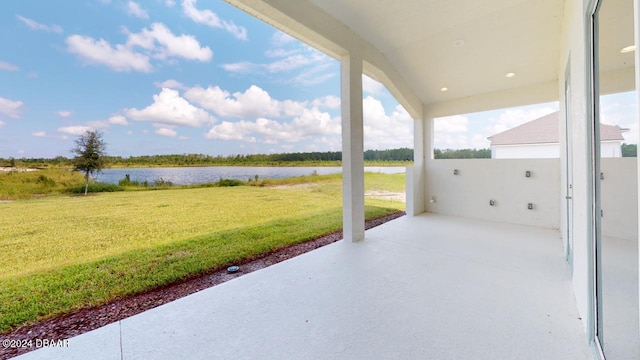 view of patio / terrace featuring a water view