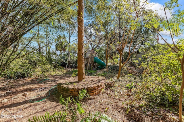 view of yard with a playground