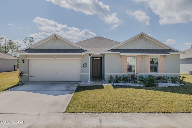 view of front facade featuring a garage and a front yard