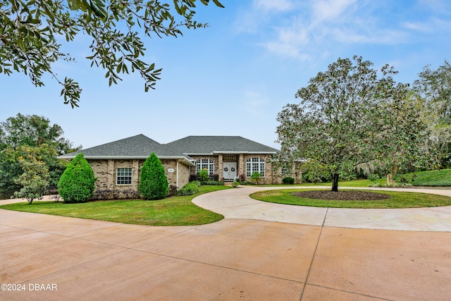 view of front of home with a front yard