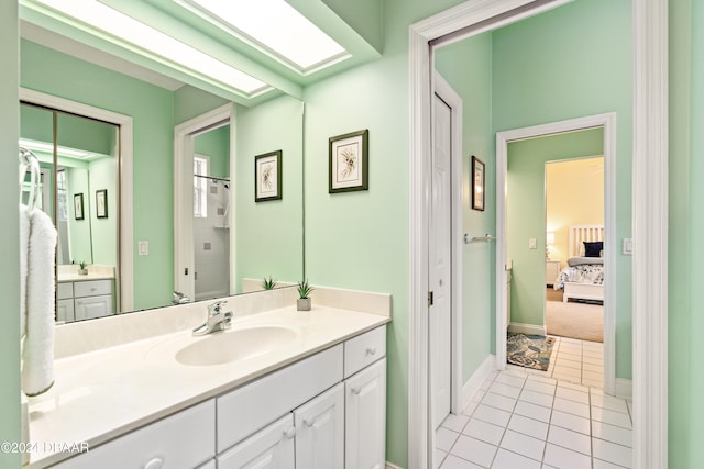 bathroom with vanity and tile patterned floors