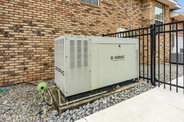 details featuring central air condition unit and concrete flooring