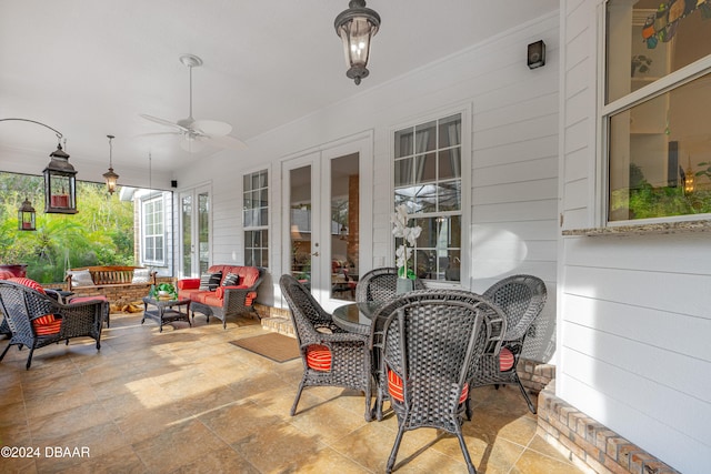 view of patio featuring an outdoor living space, french doors, and ceiling fan