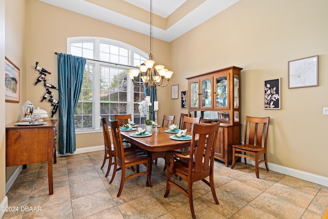 dining area featuring a chandelier