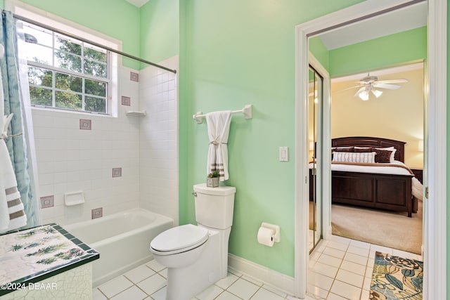 bathroom with toilet, shower / bath combo with shower curtain, tile patterned flooring, and ceiling fan