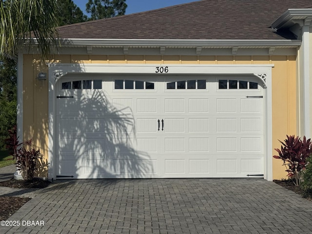 306 Coral Reef Way, Daytona Beach, FL 32124 - garage with decorative driveway