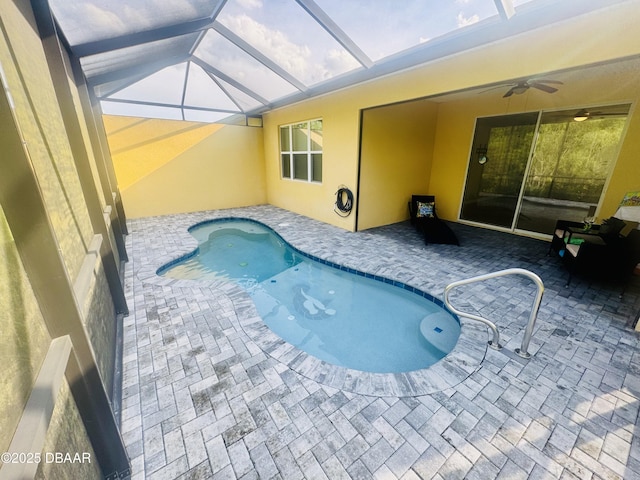 306 Coral Reef Way, Daytona Beach, FL 32124 - outdoor pool with a patio area, a ceiling fan, and a lanai