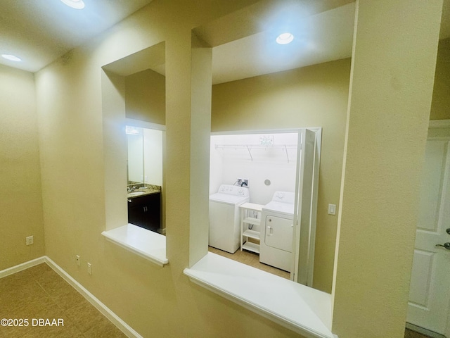 306 Coral Reef Way, Daytona Beach, FL 32124 - corridor with washer and clothes dryer and recessed lighting