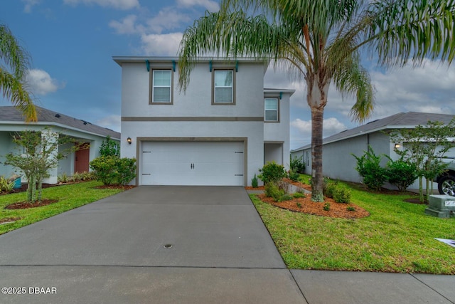 569 Armoyan Way, New Smyrna Beach, FL 32168 - traditional-style house featuring an attached garage, driveway, stucco siding, and a front yard