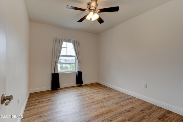 569 Armoyan Way, New Smyrna Beach, FL 32168 - spare room with light wood-type flooring, baseboards, and a ceiling fan