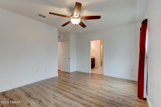 569 Armoyan Way, New Smyrna Beach, FL 32168 - spare room featuring ceiling fan, light wood finished floors, and baseboards