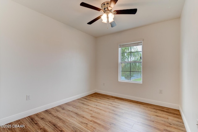 569 Armoyan Way, New Smyrna Beach, FL 32168 - spare room featuring light wood finished floors, baseboards, and ceiling fan