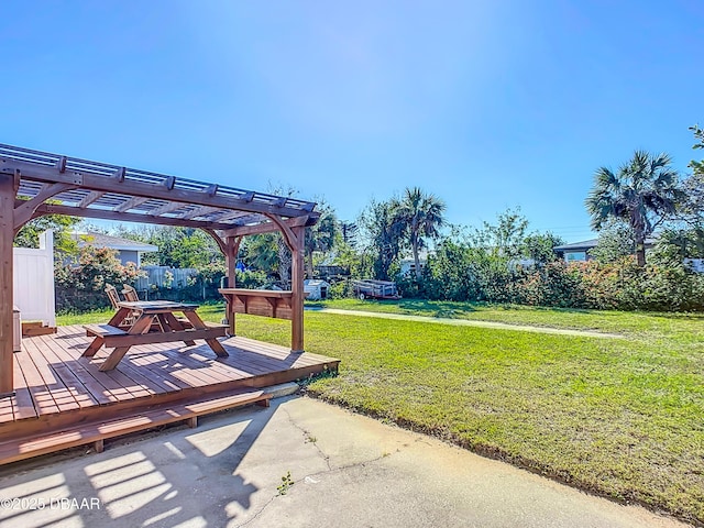 view of yard featuring a pergola and a wooden deck