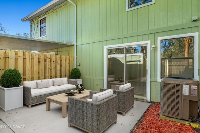 view of patio / terrace with cooling unit and an outdoor hangout area