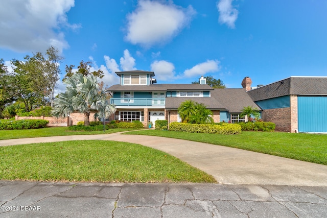 view of front of home with a front yard