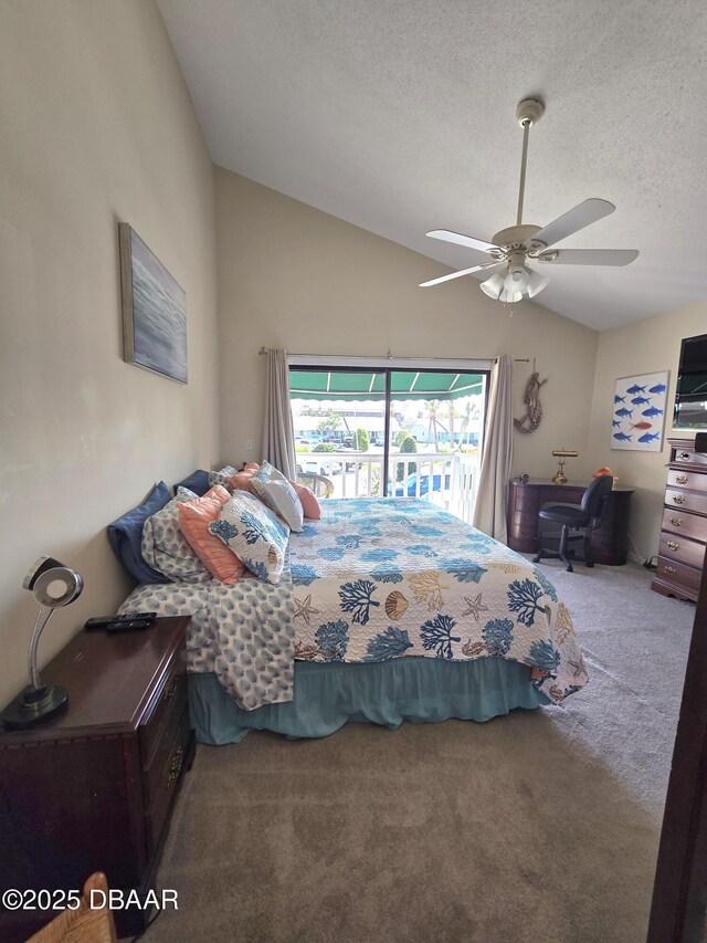 113 Lagoon Ct, New Smyrna Beach, FL 32169 - carpeted bedroom with lofted ceiling, access to outside, a textured ceiling, and ceiling fan