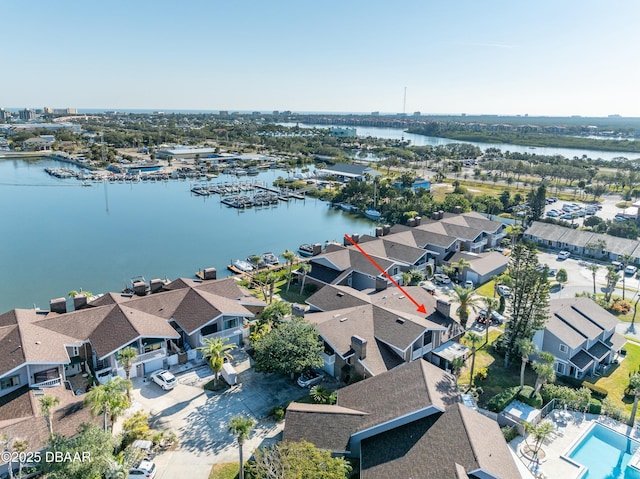 drone / aerial view with a water view