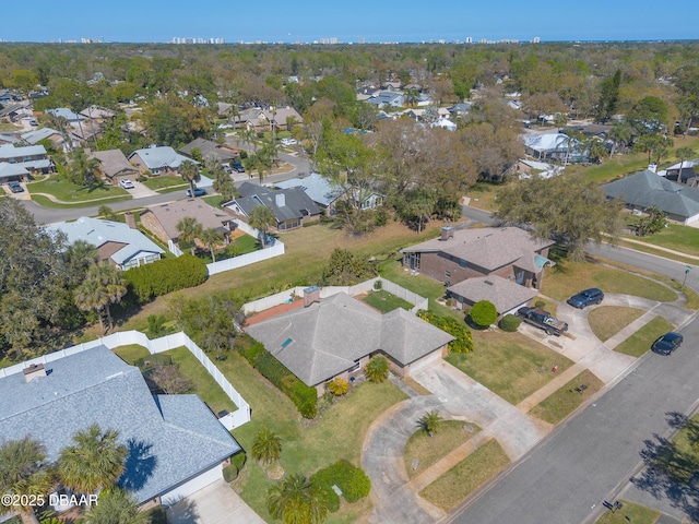 birds eye view of property with a residential view