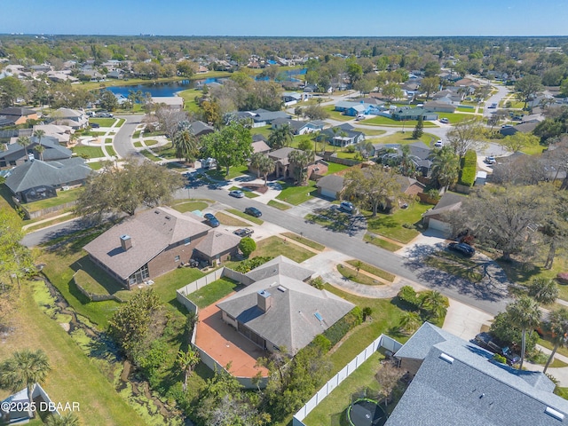 aerial view featuring a residential view and a water view