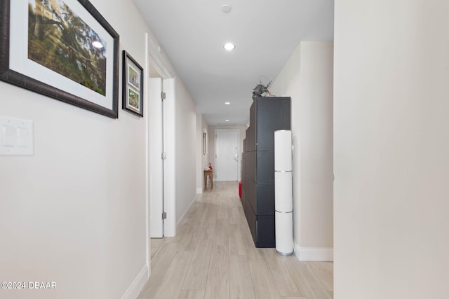 241 Riverside Dr Unit 1401-2, Holly Hill, FL 32117 - hall featuring baseboards, recessed lighting, and light wood-type flooring