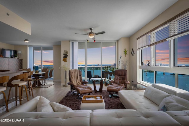 241 Riverside Dr Unit 1401-2, Holly Hill, FL 32117 - living room with wood finished floors and a ceiling fan