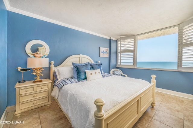 4545 S Atlantic Ave Unit 3704, Ponce Inlet, FL 32127 - tiled bedroom with baseboards and crown molding