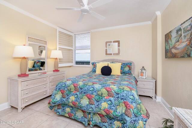 4545 S Atlantic Ave Unit 3704, Ponce Inlet, FL 32127 - bedroom with light tile patterned floors, crown molding, baseboards, and a ceiling fan