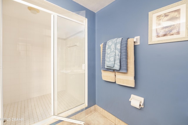 4545 S Atlantic Ave Unit 3704, Ponce Inlet, FL 32127 - bathroom with tile patterned floors and a stall shower