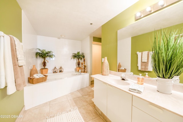 4545 S Atlantic Ave Unit 3704, Ponce Inlet, FL 32127 - bathroom featuring vanity, a bath, and tile patterned flooring
