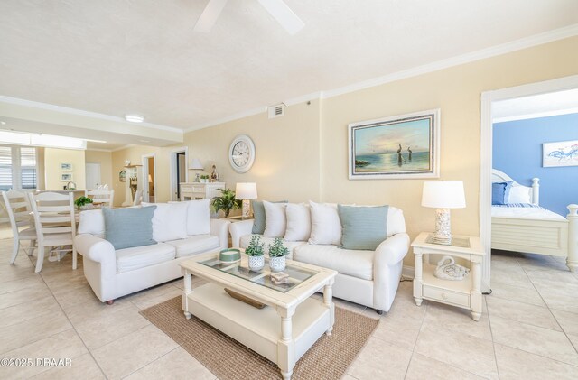 4545 S Atlantic Ave Unit 3704, Ponce Inlet, FL 32127 - living area featuring ornamental molding, light tile patterned flooring, and visible vents