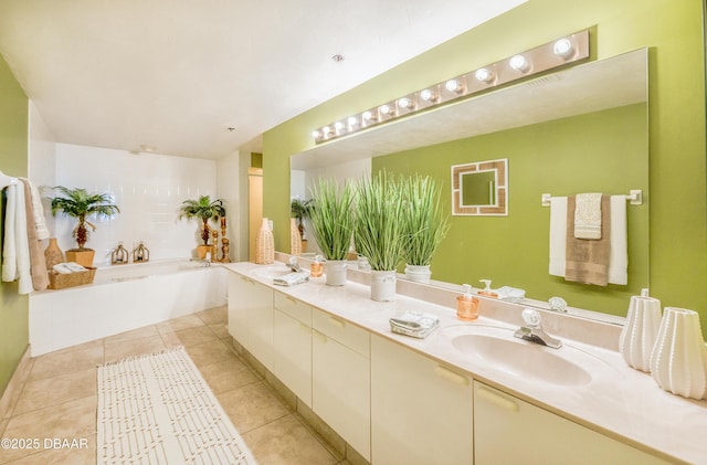 4545 S Atlantic Ave Unit 3704, Ponce Inlet, FL 32127 - full bath with a sink, double vanity, a garden tub, and tile patterned floors