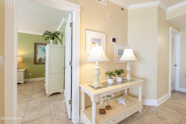 4545 S Atlantic Ave Unit 3704, Ponce Inlet, FL 32127 - corridor featuring crown molding, light tile patterned flooring, baseboards, and visible vents